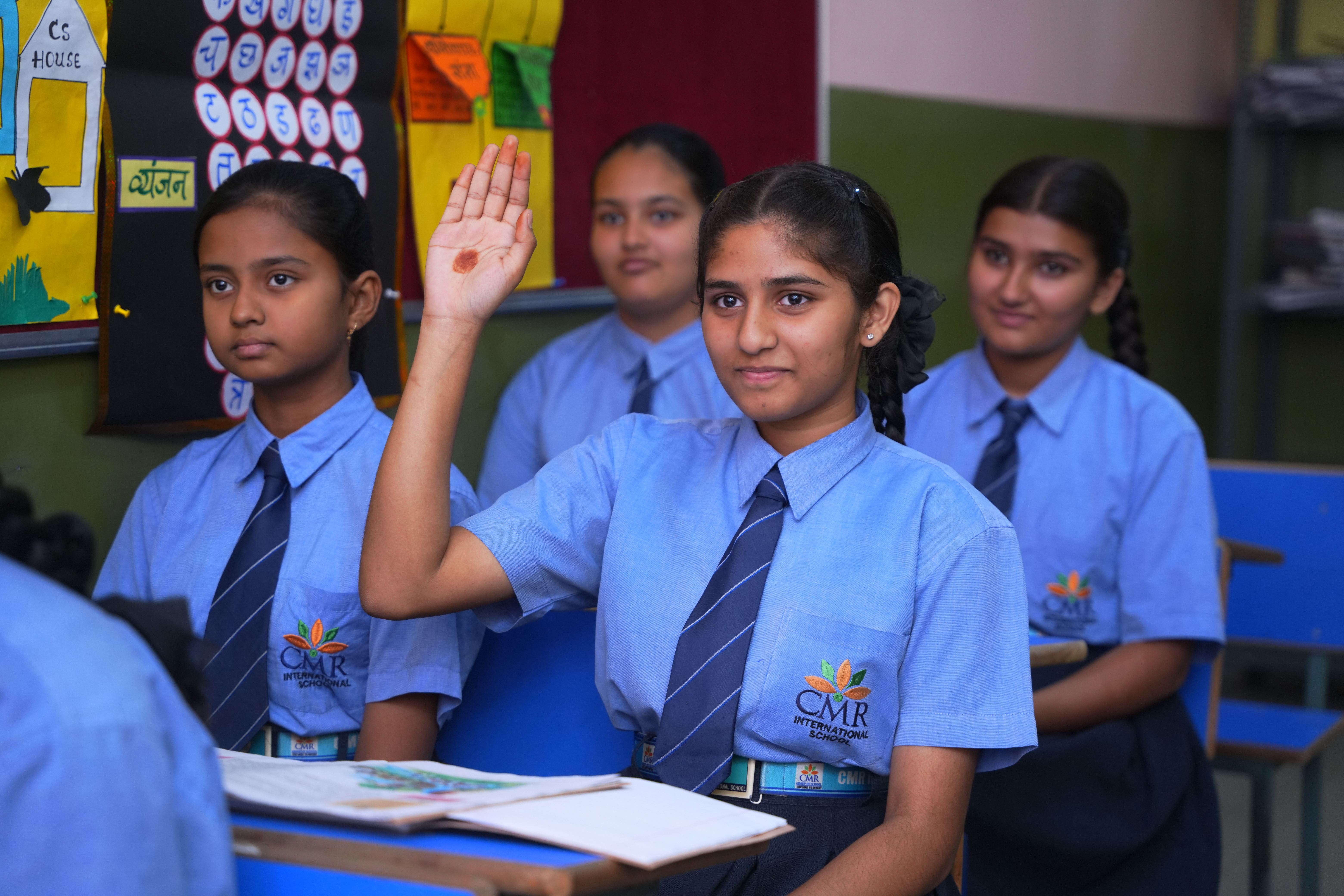 Students Raising Hands